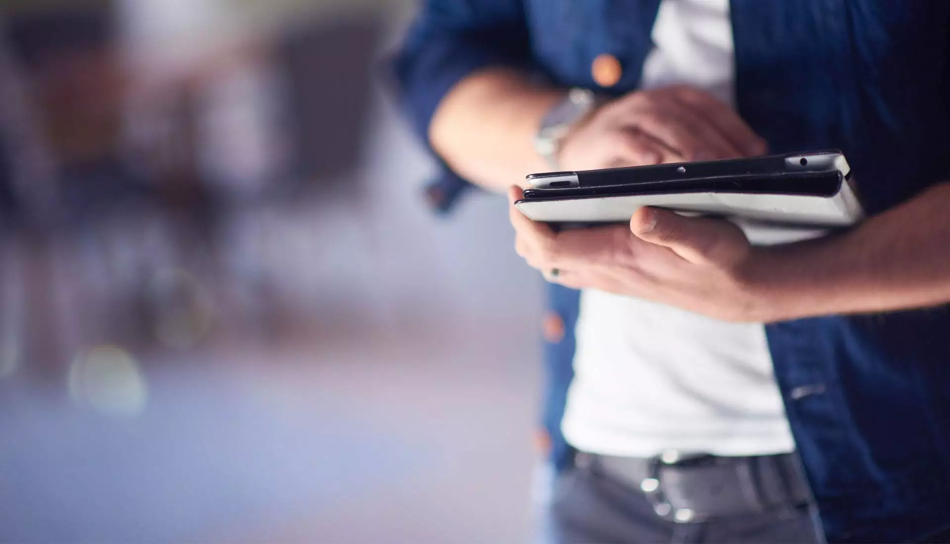 Close up of a person holding a notebook