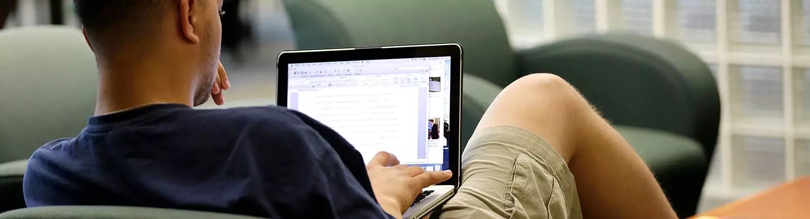 Student working on a laptop