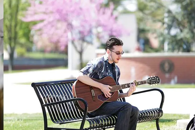 guy playing guitar