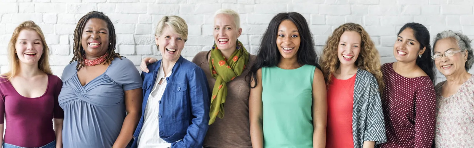 group of eight women smiling