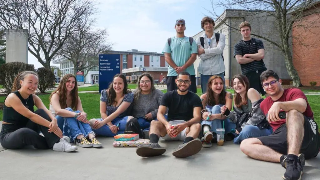 Group of students sitting on campus