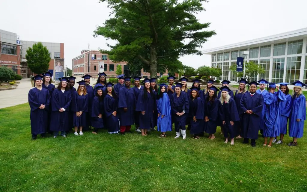 group photo of graduates in their cap and gowns