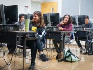 students in a classroom at computers