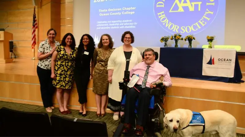 Group of students and staff at Delta Alpha PI Honor Society