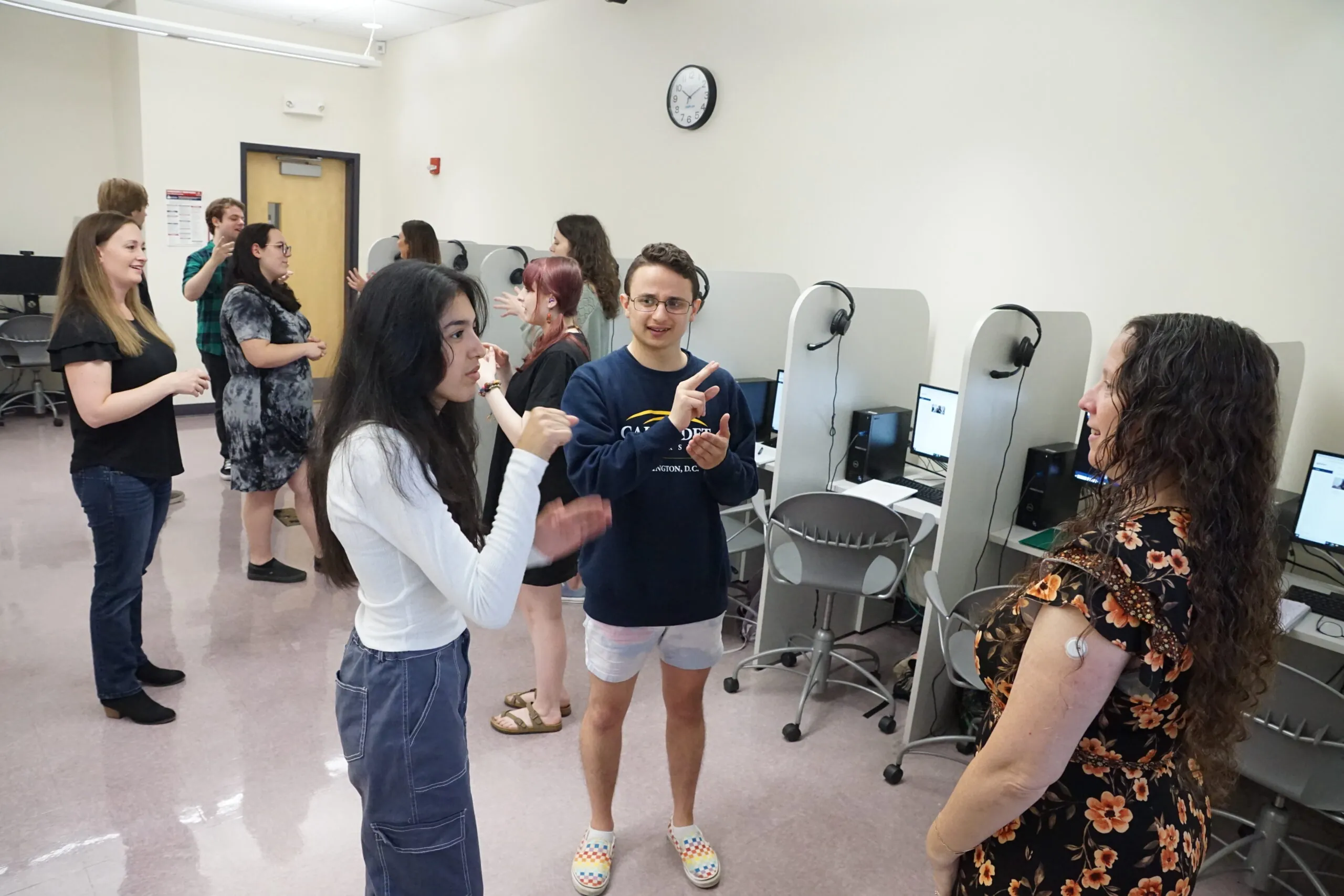 students practicing ASL