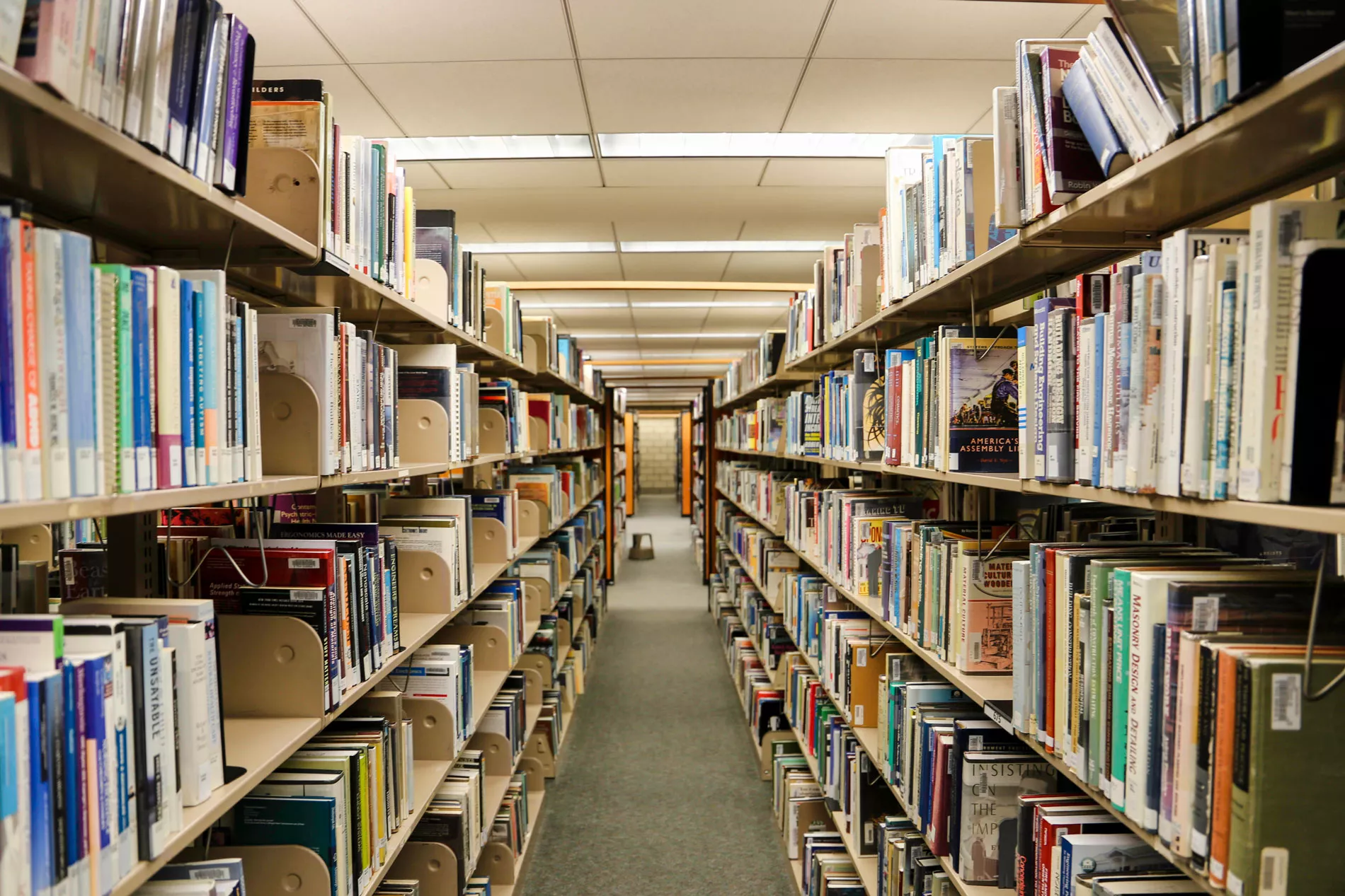 rows of bookshelves in library