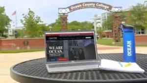 A laptop open on a table on the OCC campus