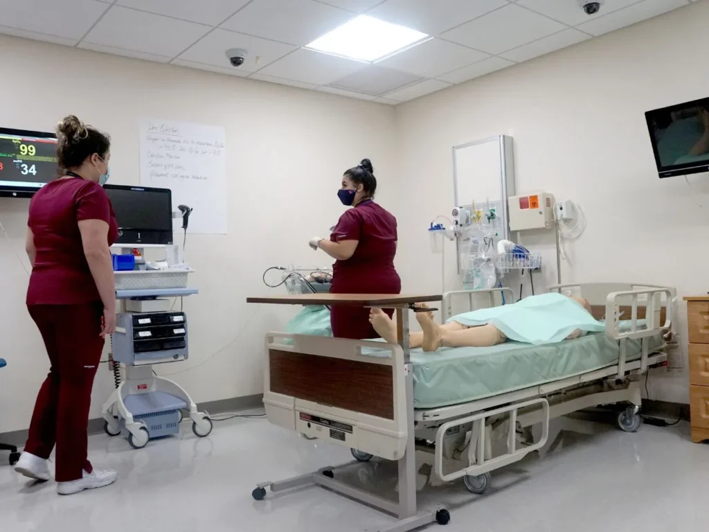 two nurses in a hospital room