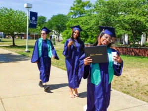 students walking at graduation