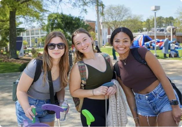 three girls smiling