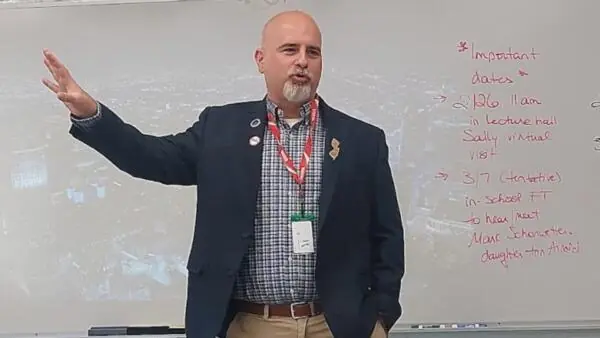 Joseph Nappi in front of whiteboard