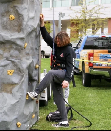 student Rock climbing